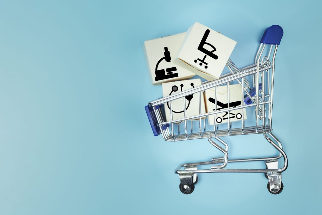 Mini shopping cart with cardboard boxes. Concept internet online shopping and delivery of goods. Copy space